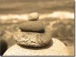 Preview: Fotofolie mit Steinen am Meer in sepia